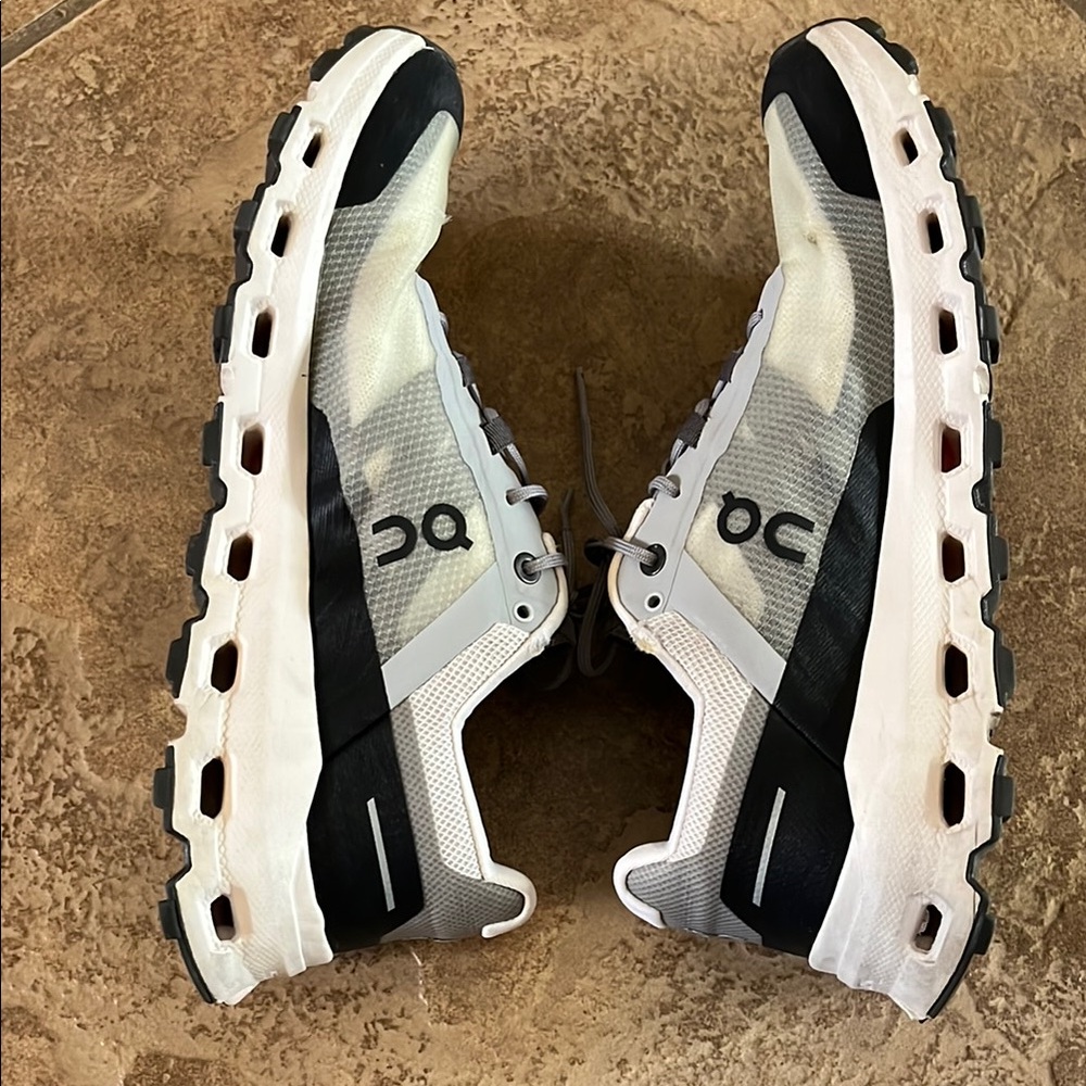 On Running Black and White Sneakers